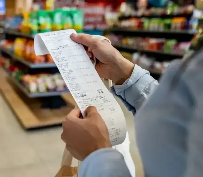 The-result-someone-holding-receipt-1